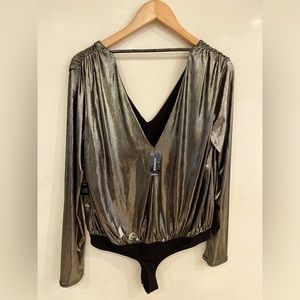 New with tags bodysuit never worn and very comfortable